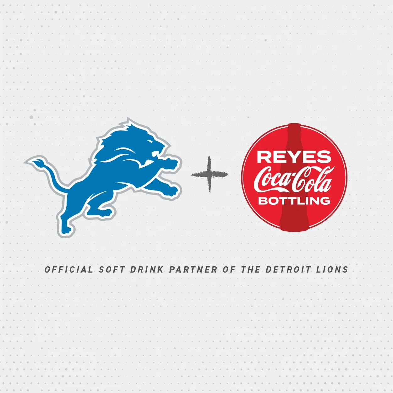 The logos of the "Detroit Lions" and "Reyers Coca Cola Bottling"